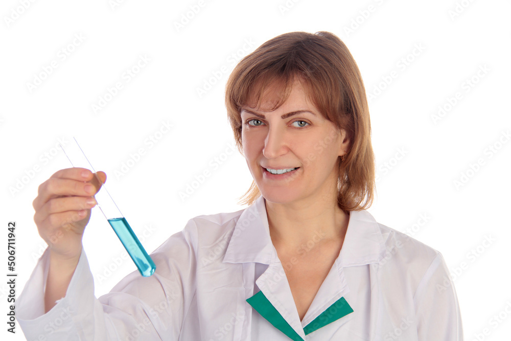 Female scientist examining a chemical reaction in a test tube Female scientist examining a chemical reaction in a test tube
