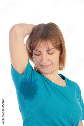 Woman sweating very badly under armpit