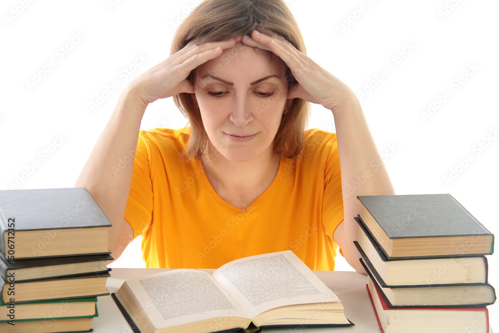 portrait of beautiful student girl sitting among the books portrait of beautiful student girl sitting among the books