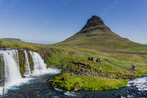 Waterfall in front of the arrowhead mountain - Iceland