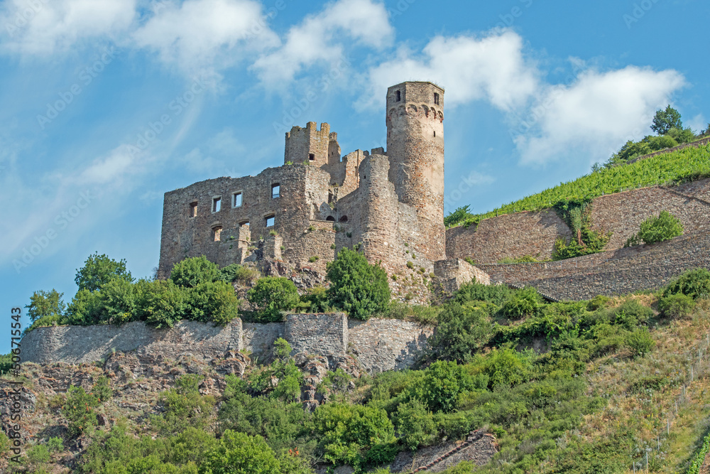 The ruins of Ehrenfels castle, built in 1212, is perched on a rocky promontory along the Rhine River in Germany.