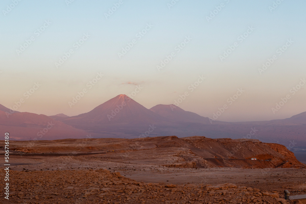 Sunset at the Moon Valley (Valle de la Luna) with the Licancabur volcano, Atacama, Chile, South America