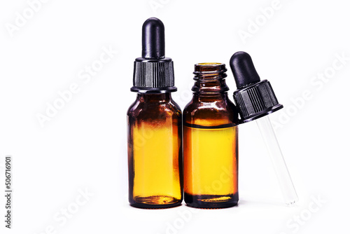 dropper bottle with mandelic acid, acid used to control acne and face oiliness, with copy space and isolated white background