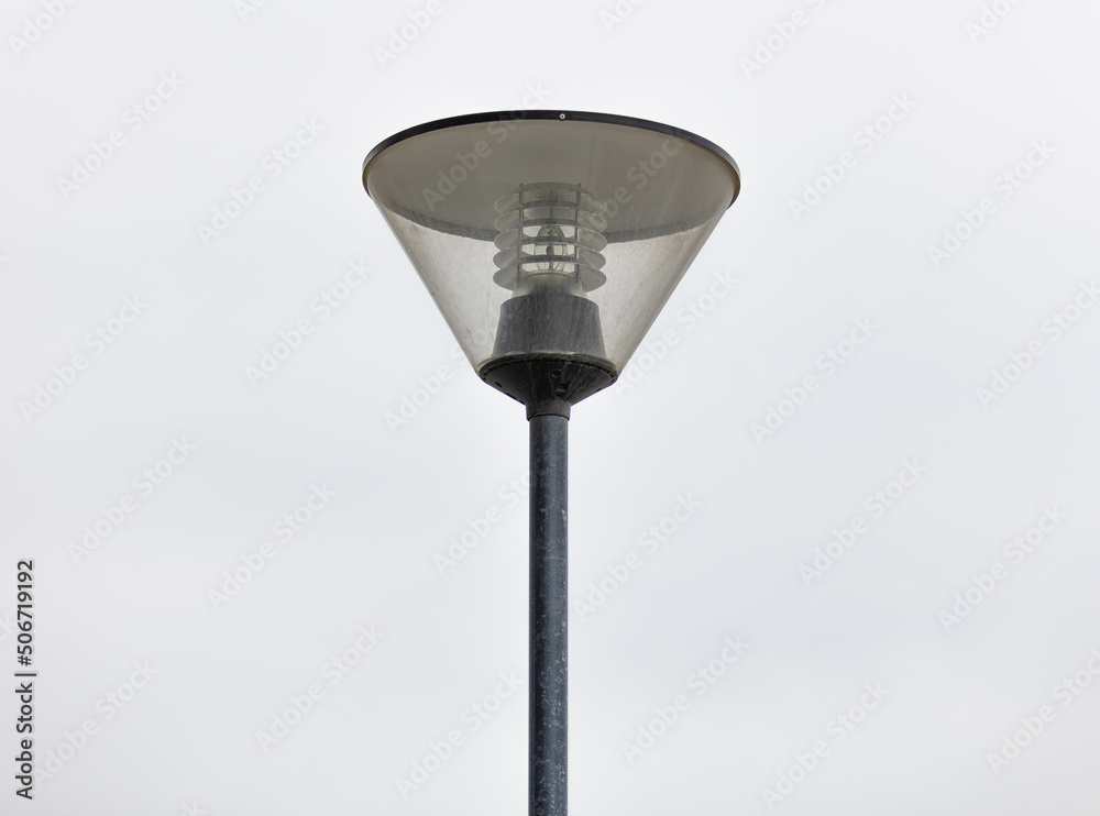 Modern street lamp on the background of a bright sky. Modern street lamp on the background of a bright sky.