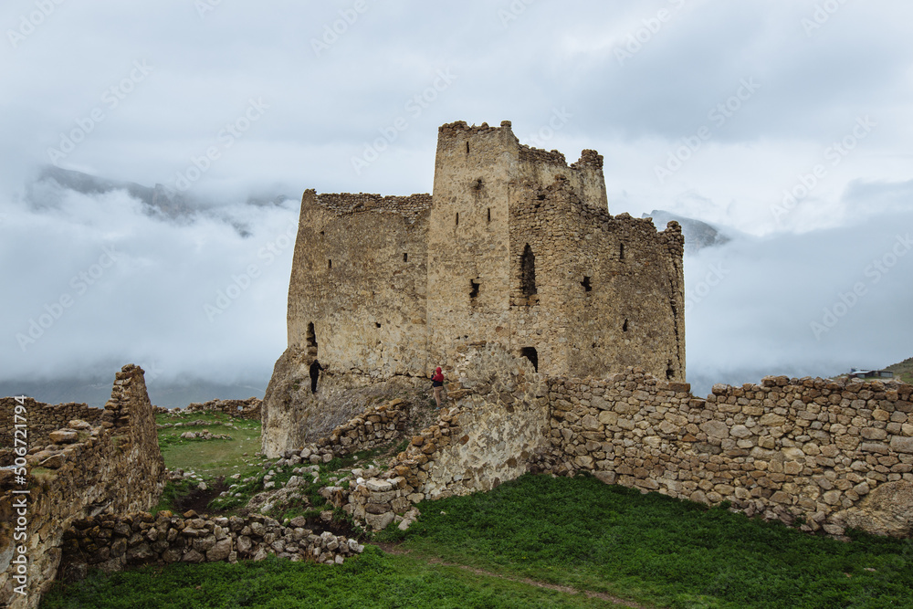 Old ruined castle Frigate in the misty mountains