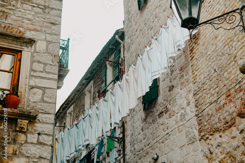 Fototapeta Naklejka Na Ścianę i Meble -  City in Europe drying clothes on the street in the city center.