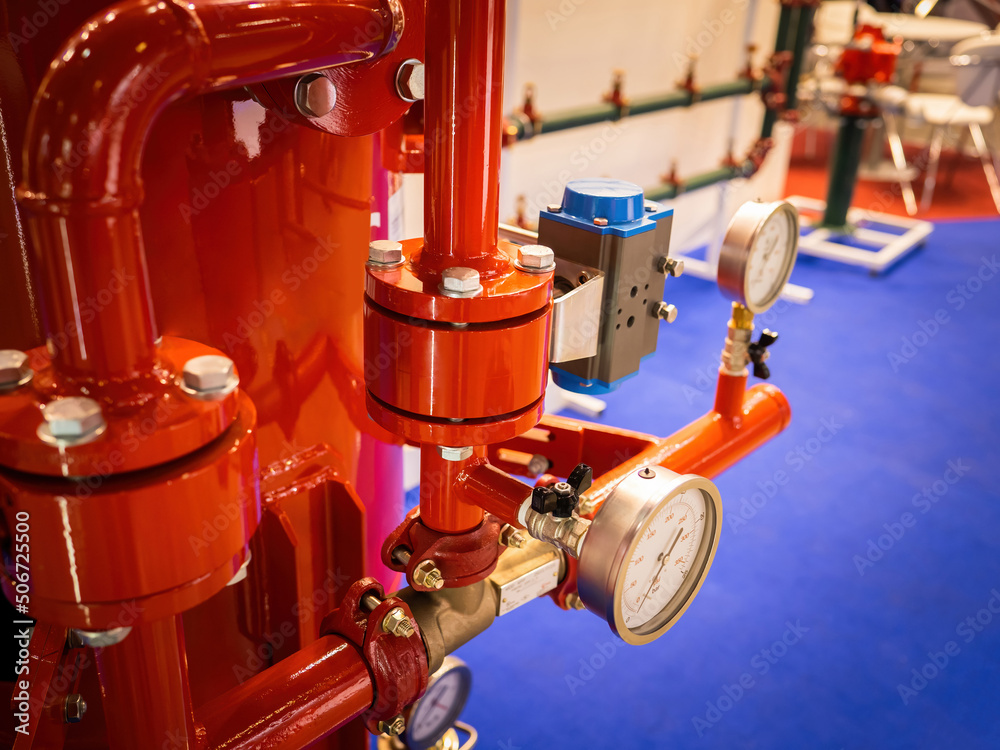 Red pipes with manometers. Equipment for diesel engine fire pump