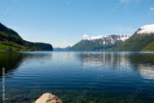Fototapeta Naklejka Na Ścianę i Meble -  Norwegian fjords. Lake. Spring. Snow.  
