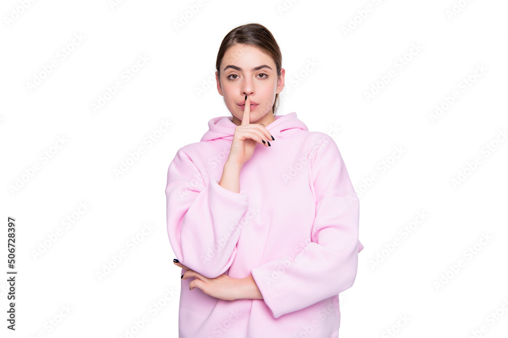 young girl in pink hoodie isolated on white background. hush young girl in pink hoodie isolated on white background. hush