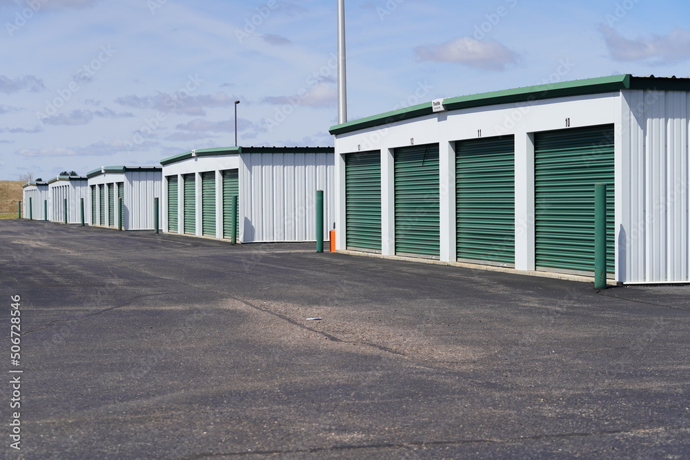Green door storage units for the community to use.
