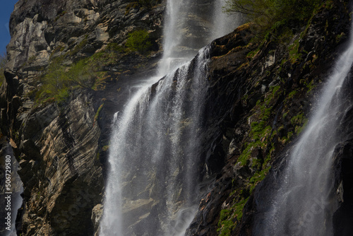 Geirangerfjord. Spring in the norwegian fjords. Reflections. Fishing. Waterfalls. Trees. Boats. Light and clouds. 