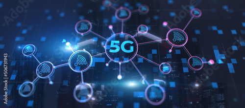 5G network digital hologram. High-speed mobile and internet on city background photo