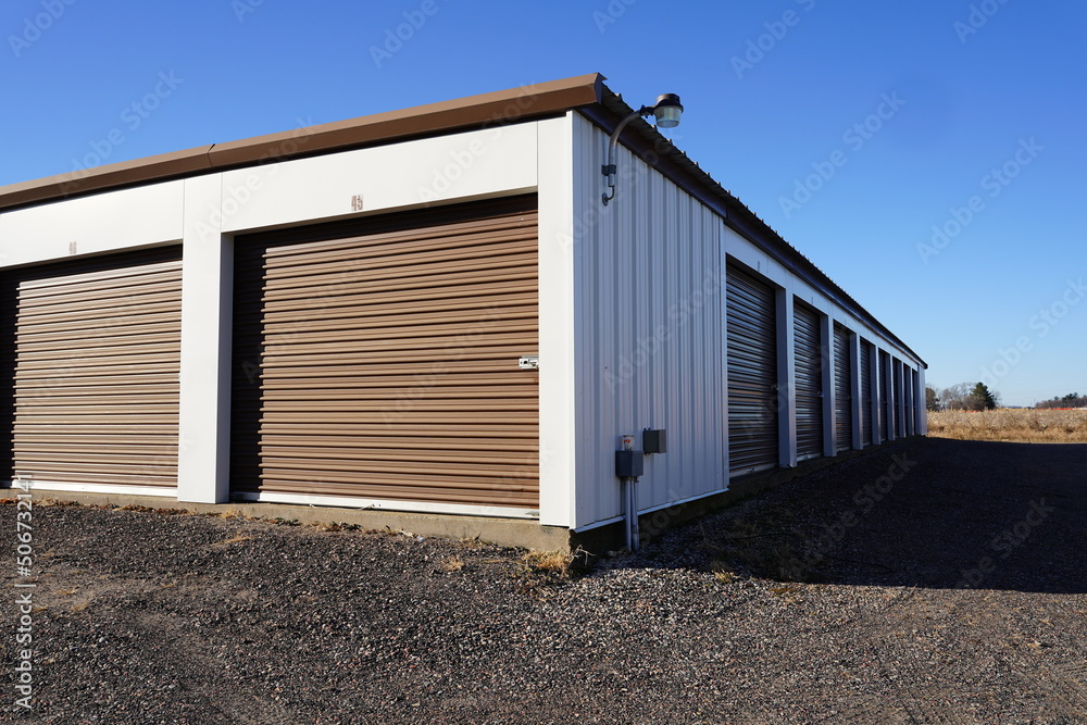 Storage unit buildings sit outside holding the owner's property. Storage unit buildings sit outside holding the owner's property.