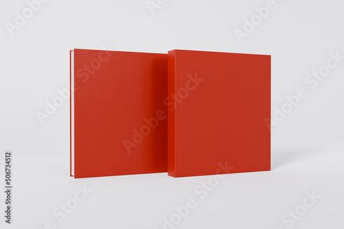 Mockup of a square book with a blank glossy red cover on white background. Front and back cover visible. Isolated with clipping path.