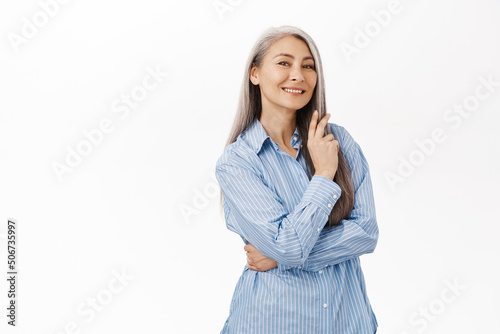 Photography Beautiful asian lady, senior woman with grey hair, good facial skin, smiling and