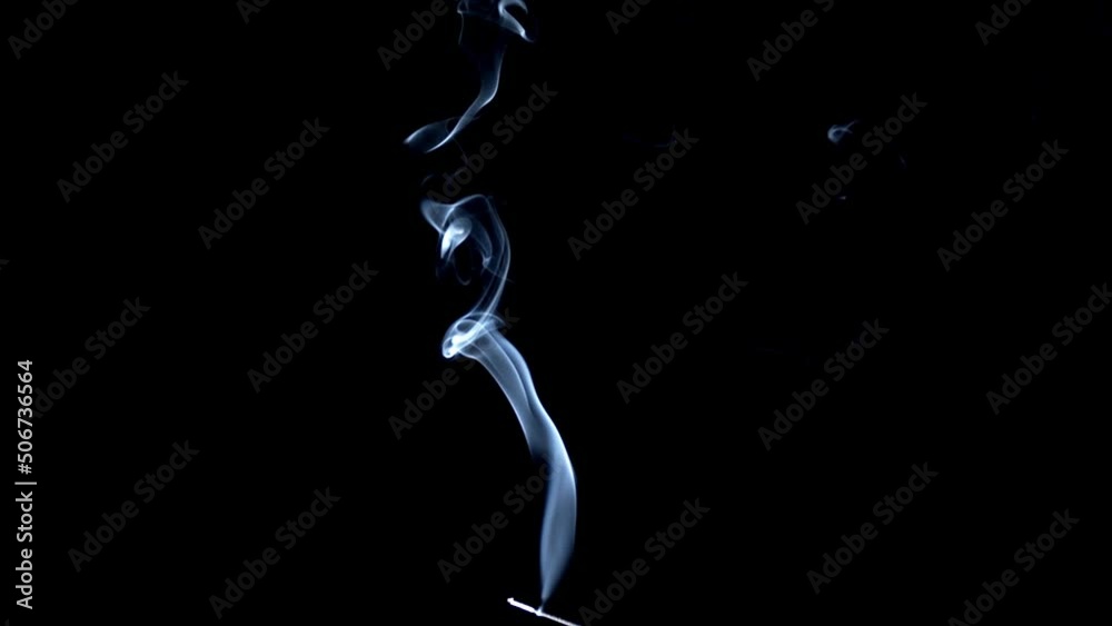 Real smoke on a black background. Thin Flexible Trickle of Real Smoke. Colorful real smoke rises up. Ideal for background or over-layer with blending mode add, screen, lighten. Real smoke on a black background. Thin Flexible Trickle of Real Smoke. Colorful real smoke rises up. Ideal for background or over-layer with blending mode add, screen, lighten.