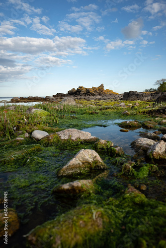 rocks and sea on the coast of bornholm in the baltic sea near the city allinge photo