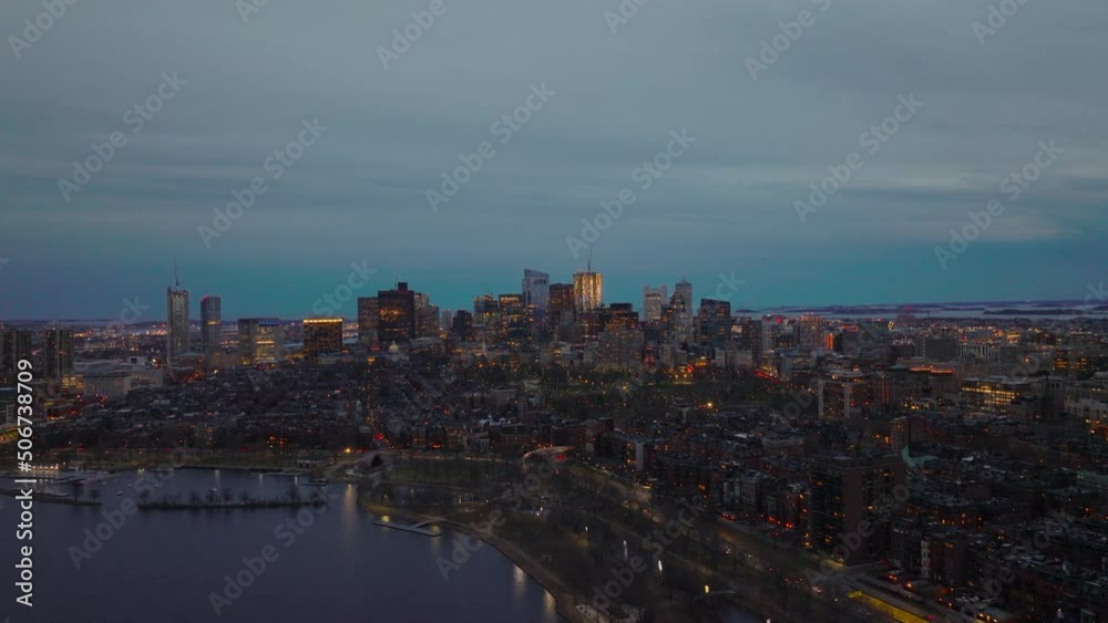 Aerial panoramic view of urban neighbourhood and high rise office buildings in background. Evening cityscape. Boston, USA Aerial panoramic view of urban neighbourhood and high rise office buildings in background. Evening cityscape. Boston, USA