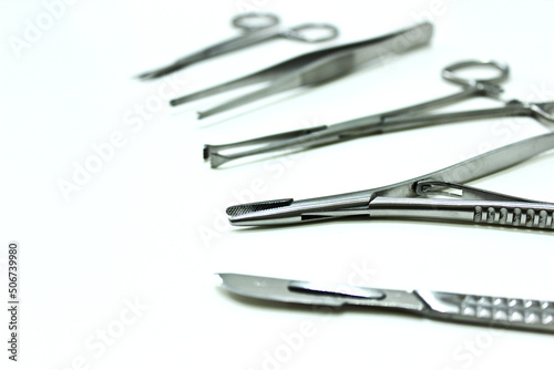 Surgical instruments isolated on the white background  focus on needle holder