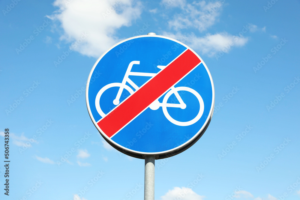 Traffic sign End Of Cycleway against blue sky