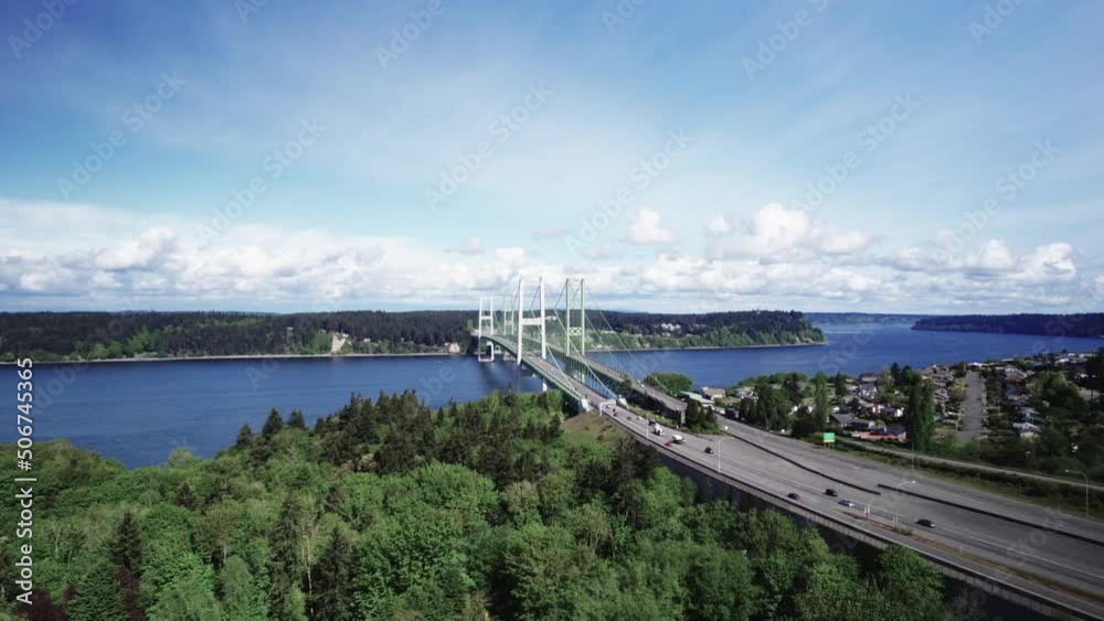 Traffic flows smoothly over the Tacoma Narrows Bridges, Puget Sound, aerial panorama Traffic flows smoothly over the Tacoma Narrows Bridges, Puget Sound, aerial panorama