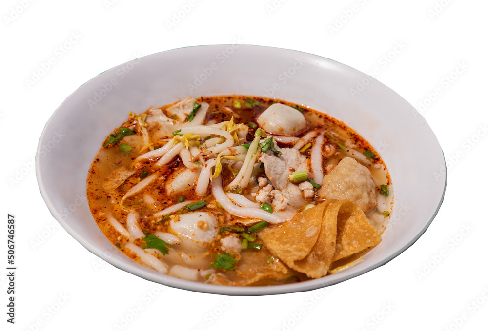 Spicy silver needle noodle chinese soup or Spicy silver pin noodle chinese soup (Tom yum giam ii soup) with fish balls, shrimp meatballs, pork, steamed ground pork, fried wonton, ground peanut and gr Spicy silver needle noodle chinese soup or Spicy silver pin noodle chinese soup (Tom yum giam ii soup) with fish balls, shrimp meatballs, pork, steamed ground pork, fried wonton, ground peanut and gr