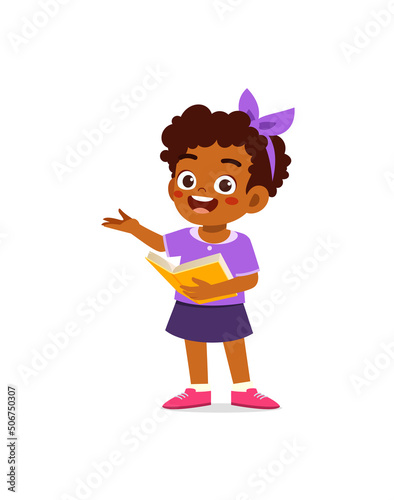little kid standing and read a book