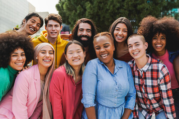 Multiethnic diverse group of people having fun outdoor - Diversity lifestyle concept