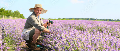 Farmer watering beautiful l...
