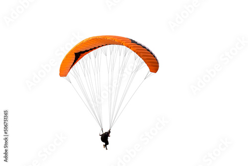 Beautiful paraglider in flight on isolated white background. photo