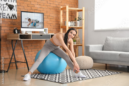 Woman doing exercises with ...