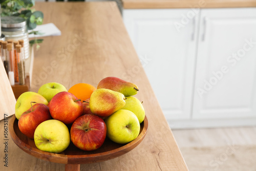 Tray with fruits on wooden ...