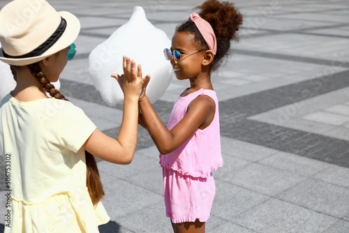 Cute little girls with cott...