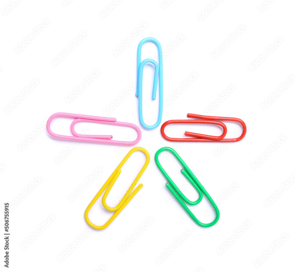 Colorful paper clips on white background, top view Colorful paper clips on white background, top view