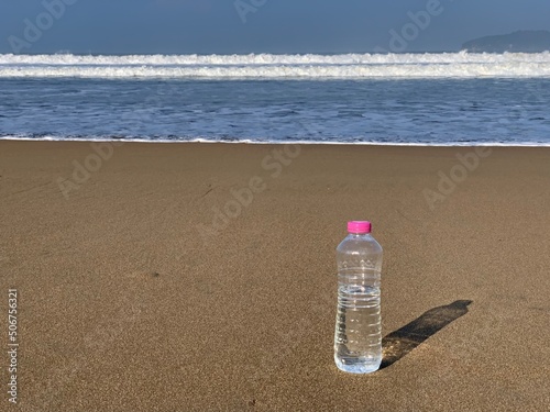 mineral water bottle on the beach