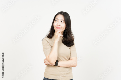 Thinking and Curious Of Beautiful Asian Woman Isolated On White Background © Sino Images Studio