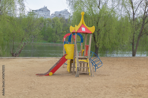 Wallpaper Mural Children's playground on the beach in front of a pond in spring time Torontodigital.ca