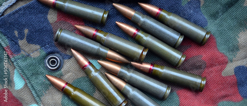 Ammunition 7,62x39 with camo background