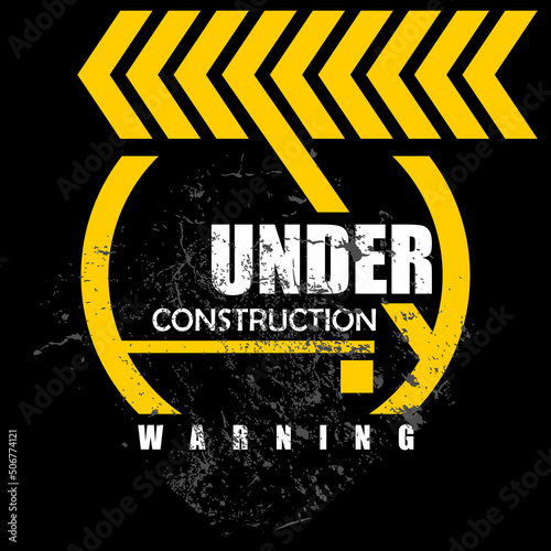 under construction sign and wall paper