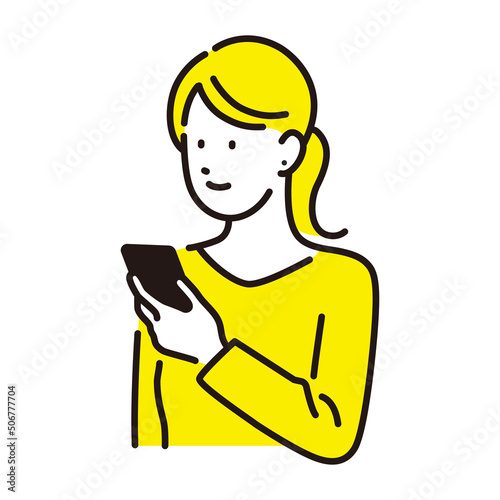 スマホを見る女性