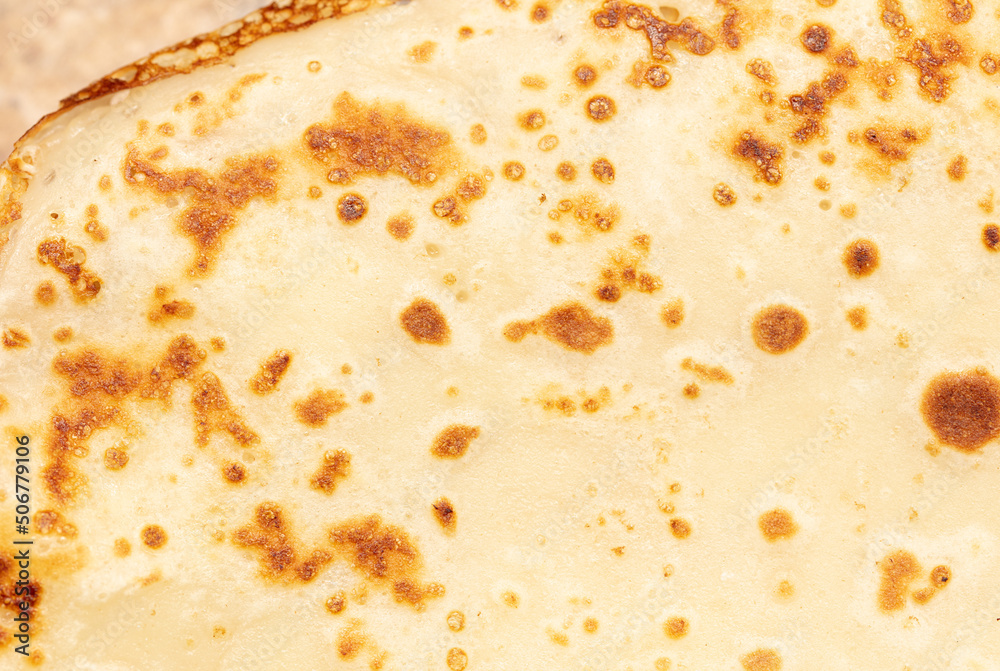 Pan fried pancake as a background. Pan fried pancake as a background.