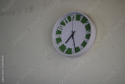 clock on the wall of the house