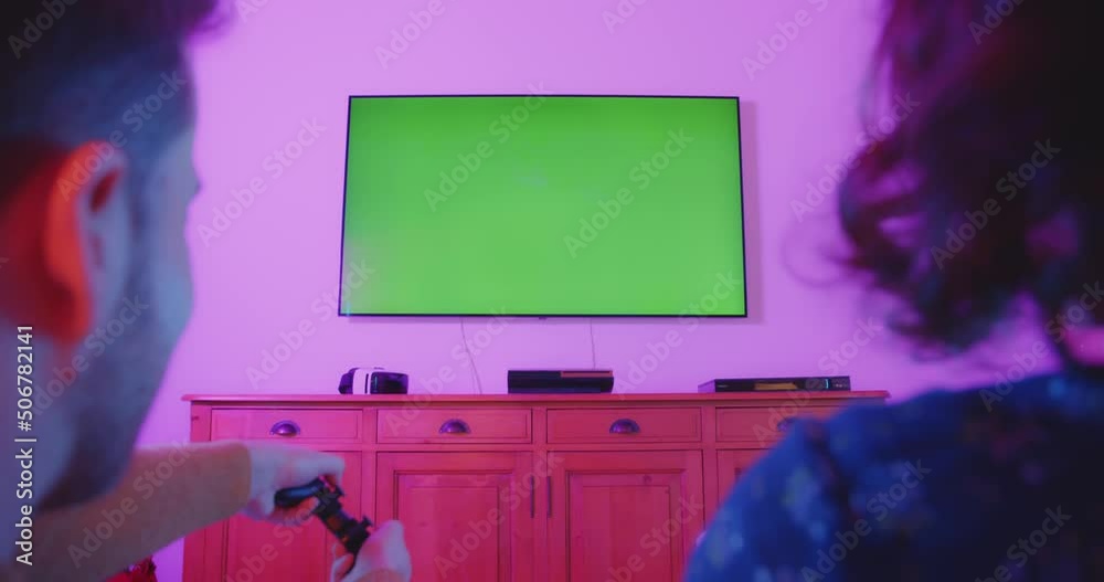 Playing Video Games Console Living Room Eveening Colorful
