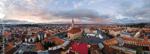 Aerial drone panoramic view of Saint Michael Church in Cluj at sunset, Romania photo