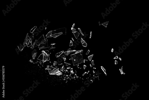 Broken glass on the black bachground. Isolated realistic cracked glass effect photo
