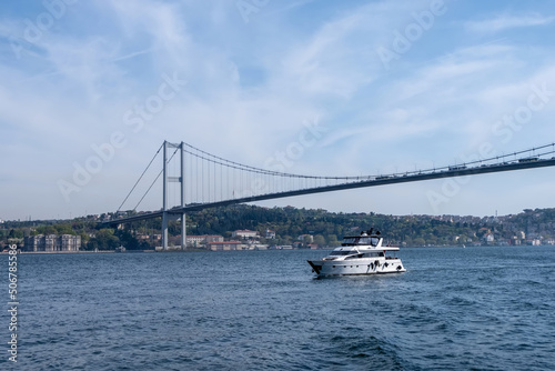 Landscape of the one side of the Bosphorus and a boat passing by © frimufilms