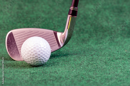 golf ball on green background photo