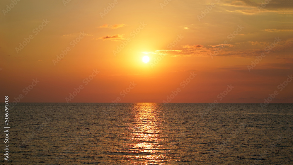 Sunset over the Black Sea. Evening sun over the horizon. Beauty world natural outdoor travel background. Sunset over the Black Sea. Evening sun over the horizon. Beauty world natural outdoor travel background.