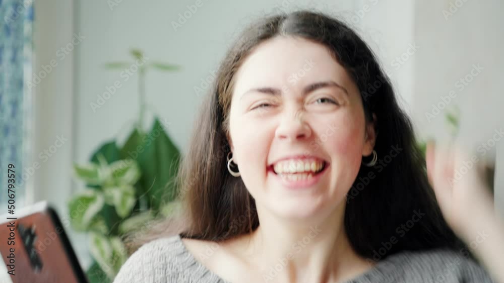 Portrait of amazed woman bulging eyes using at a smartphone. Zoom in. Social media concept. Portrait of amazed woman bulging eyes using at a smartphone. Zoom in. Social media concept.