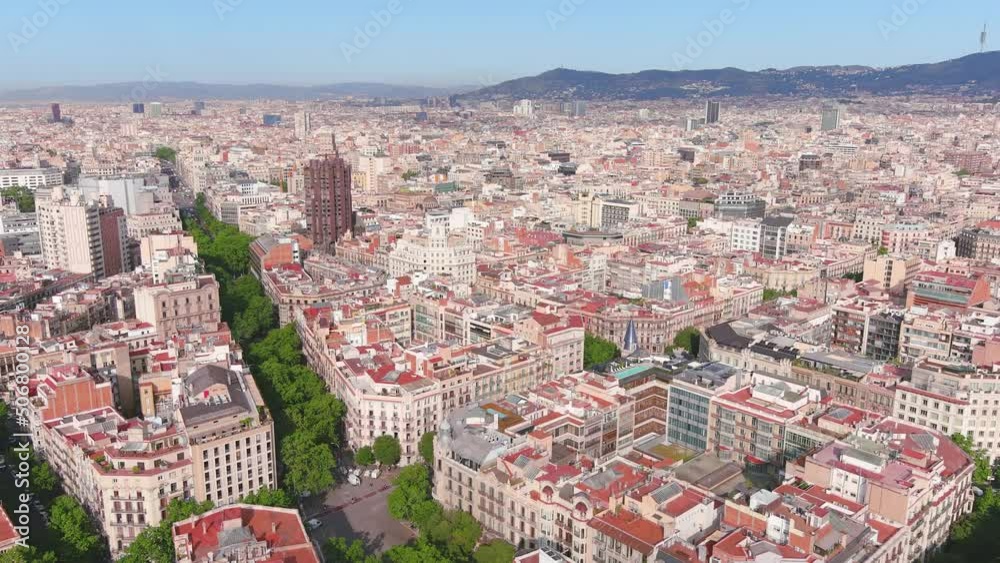 Barcelona, Spain: Aerial view of capital city of Catalonia, sunny day - landscape panorama of Europe from above Barcelona, Spain: Aerial view of capital city of Catalonia, sunny day - landscape panorama of Europe from above